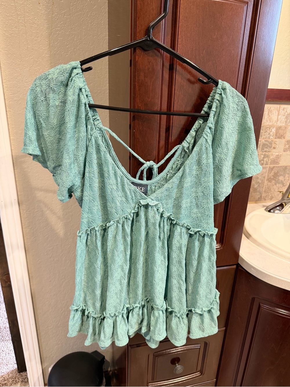 Buckle Mint Green Ruffle Tie-Back Peplum Tunic